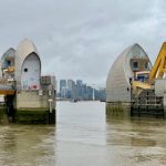 Structure of the Thames River Barrier and Modern Architecture Skyline